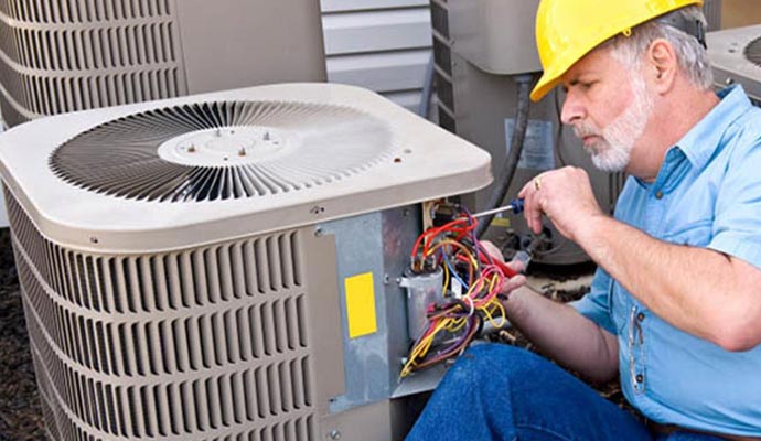 Person repairing heater system