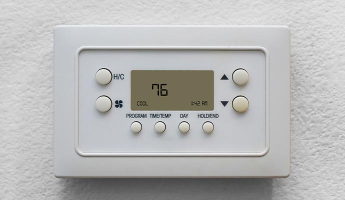 Smart ac thermostat installed on wall